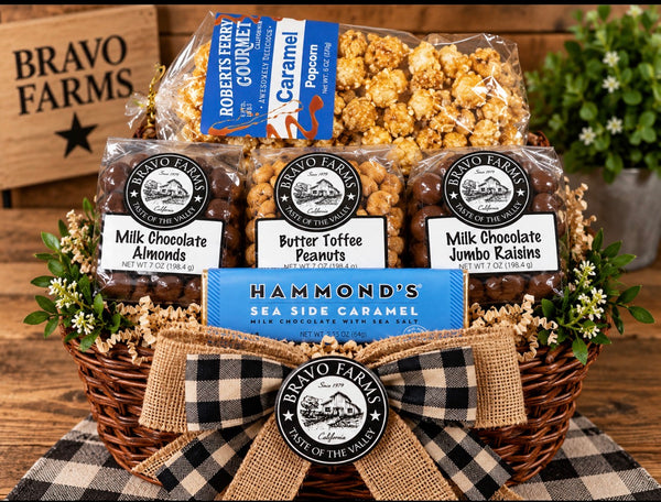 Bravo’s Finest gift basket with caramel popcorn, milk chocolate almonds, butter toffee peanuts, milk chocolate jumbo raisins and a milk chocolate sea salt caramel bar