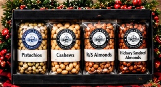 Four Nut Gift Pack - pistachios, cashews, roasted & salted almonds and hickory smoked almonds in a black Bravo Farms gift box