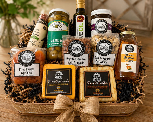 Gourmet Classic gift basket - Bari olive oil, plum jam, Gouda and Chipotle Cheddar, pistachios, dry roasted almonds, orange blossom honey, garlic stuffed olives, salami and dried apricots
