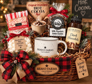 Hot Cocoa Basket with hot cocoa mix, dark chocolate sauce, marshmallows, milk chocolate jumbo raisins, peppermint divinity and a Bravo Farms campfire mug