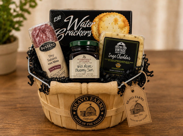 Mini Charcuterie Basket with water crackers, sage cheddar, dry salami and wild Maine blueberry jam in a Bravo Farms basket