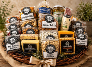 The Boss gift basket with cheeses, salami, olives, peanut brittle, chocolates and nuts