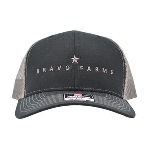 Black and grey mesh snapback cap with a Bravo Farms star logo