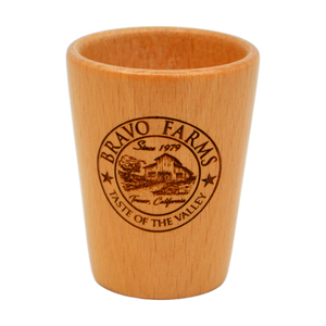 Wooden shot glass engraved with the Bravo Farms logo