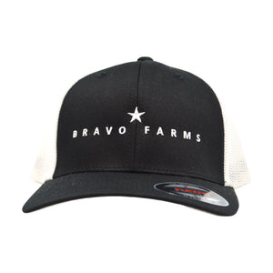Black and white mesh cap with a Bravo Farms star logo