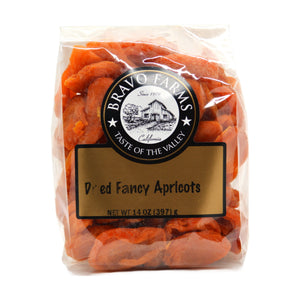 Dried fancy apricot halves in a 14 oz Bravo Farms bag