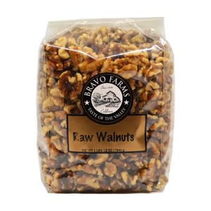 Raw walnut pieces in a 28 oz (1 lb 12 oz) Bravo Farms bag