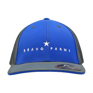 Royal blue and graphite grey Flexfit cap with a Bravo Farms star logo