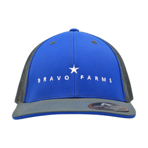 Royal blue and graphite grey Flexfit cap with a Bravo Farms star logo